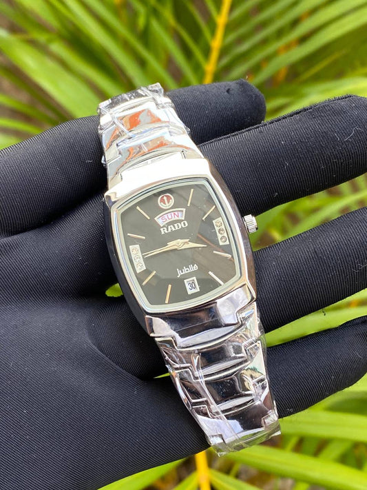 RADO GENTS WATCH DAY&DATE DISPLAY STAINLESS STEEL BATTERY POWERED WATER RESISTANT ENGRAVING SERVICES PER WORD,300 LOGO ENQUIRIES