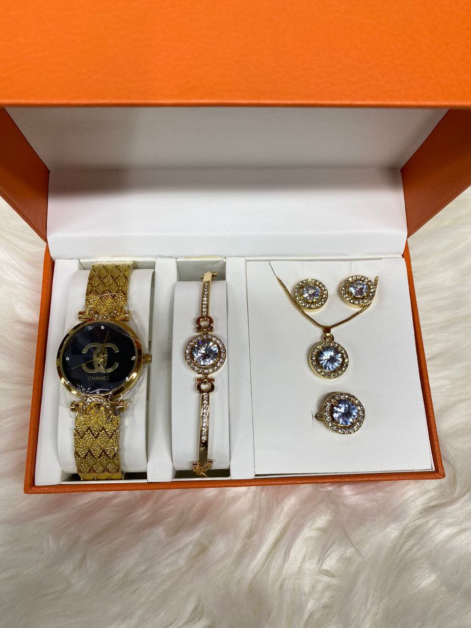 A SET OF WATCH BRACELET NECKLACE EARRINGS RING