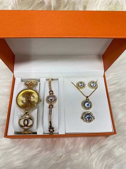 A SET OF WATCH BRACELET NECKLACE EARRINGS RING