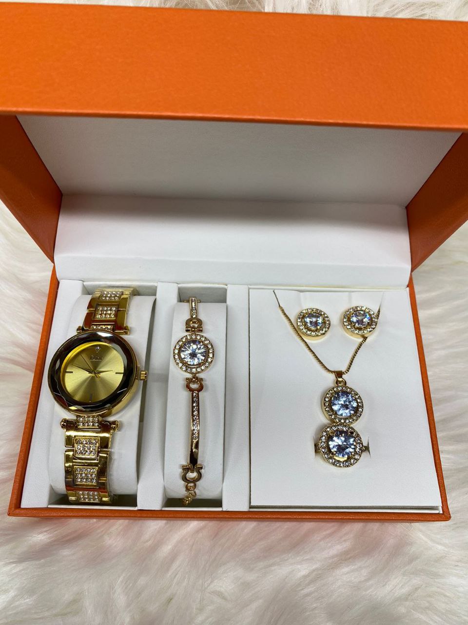 A SET OF WATCH BRACELET NECKLACE EARRINGS RING