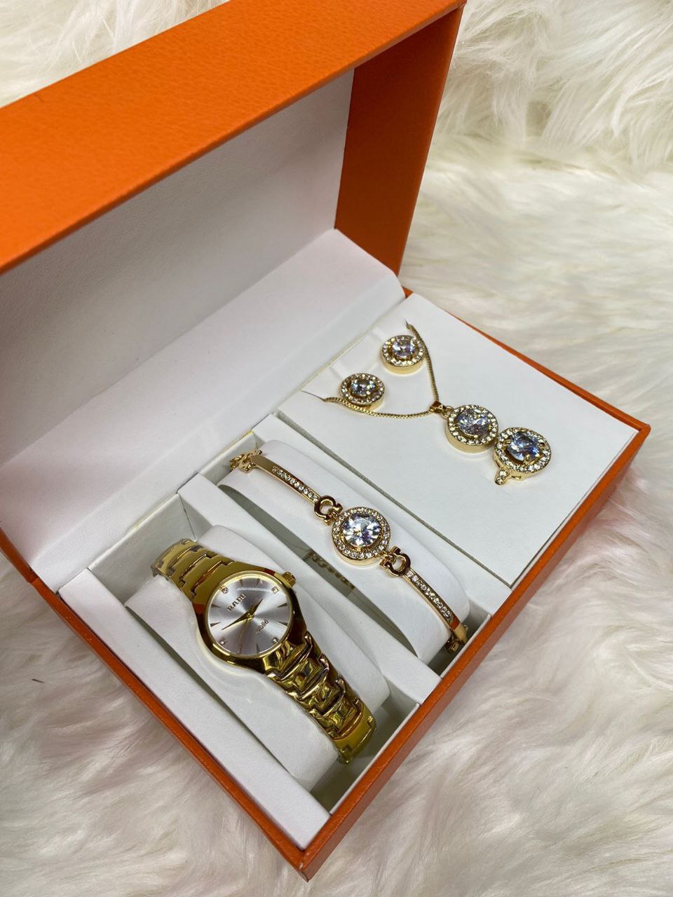 A SET OF WATCH BRACELET NECKLACE EARRINGS RING