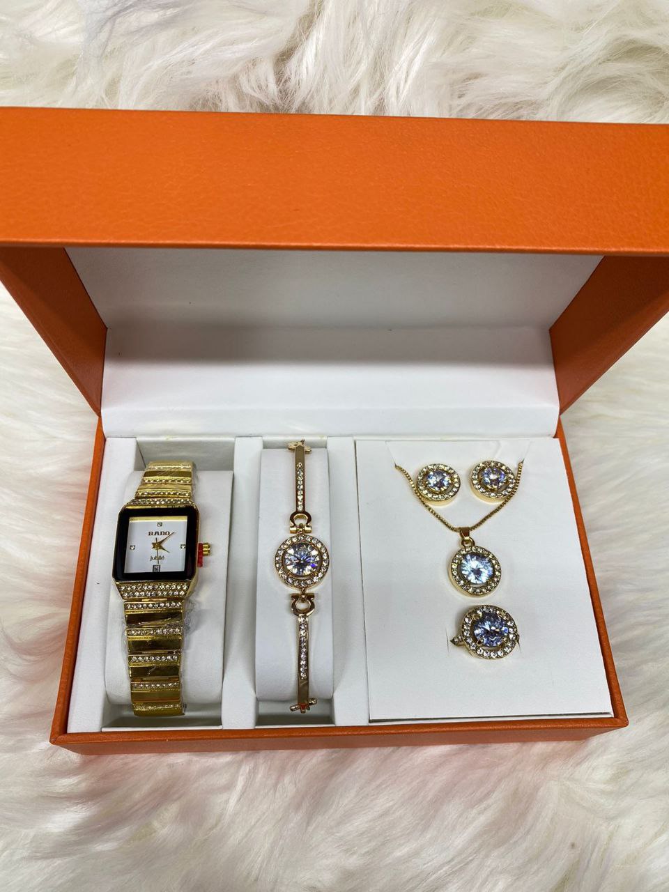 A SET OF WATCH BRACELET NECKLACE EARRINGS RING