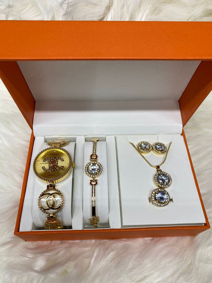 A SET OF WATCH BRACELET NECKLACE EARRINGS RING