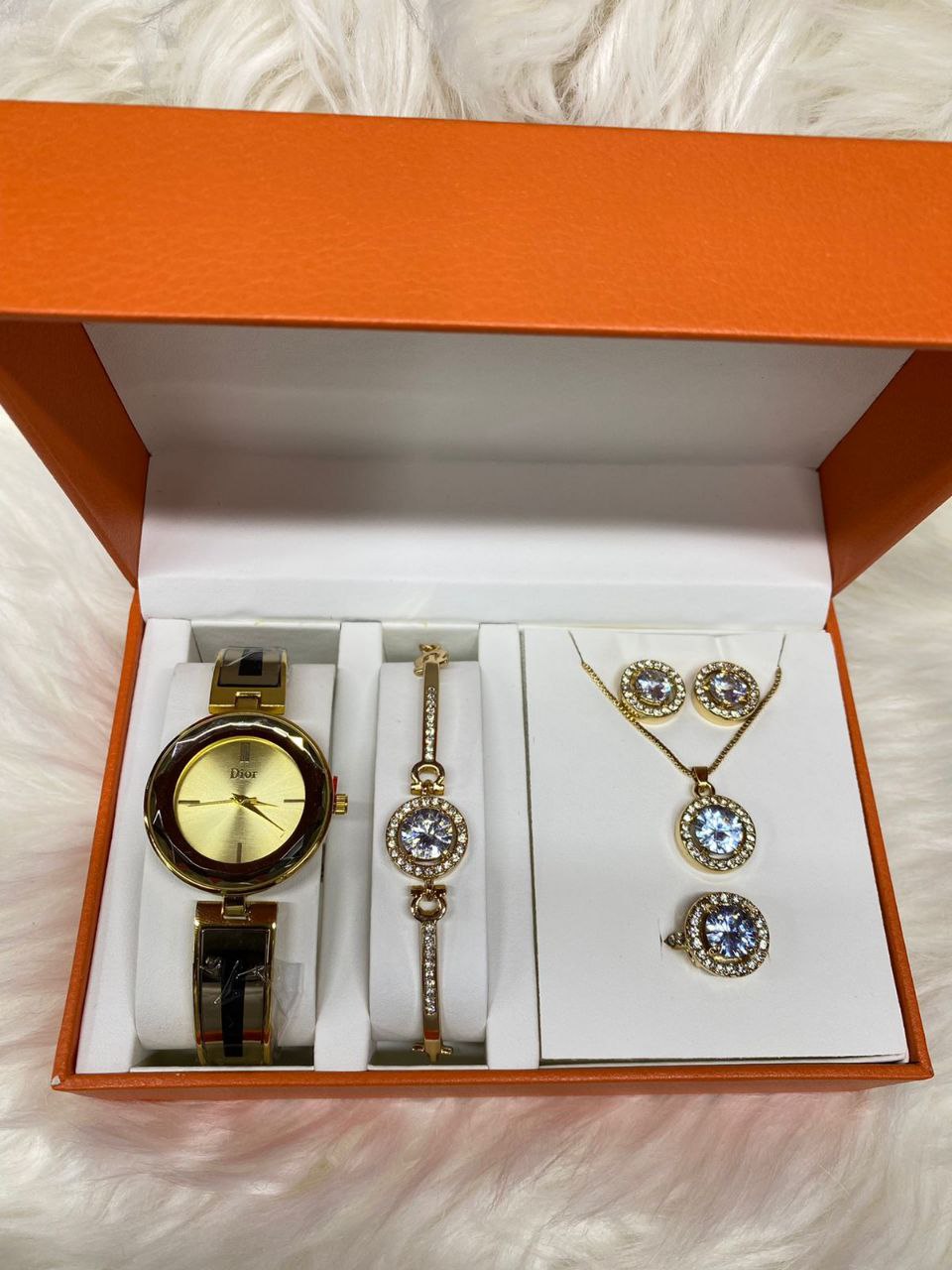 A SET OF WATCH BRACELET NECKLACE EARRINGS RING