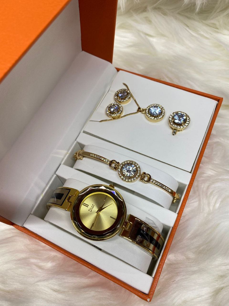 A SET OF WATCH BRACELET NECKLACE EARRINGS RING