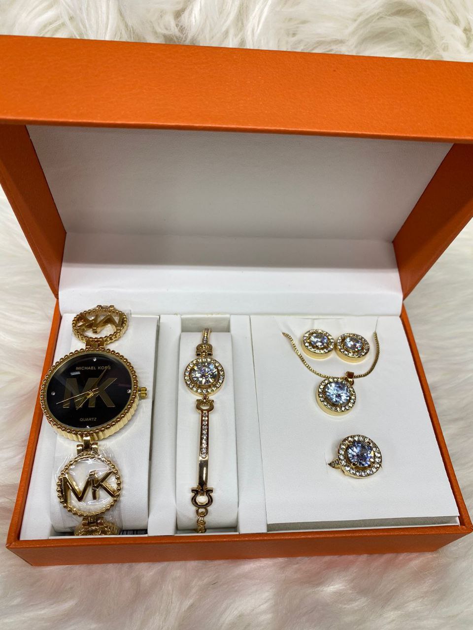 A SET OF WATCH BRACELET NECKLACE EARRINGS RING