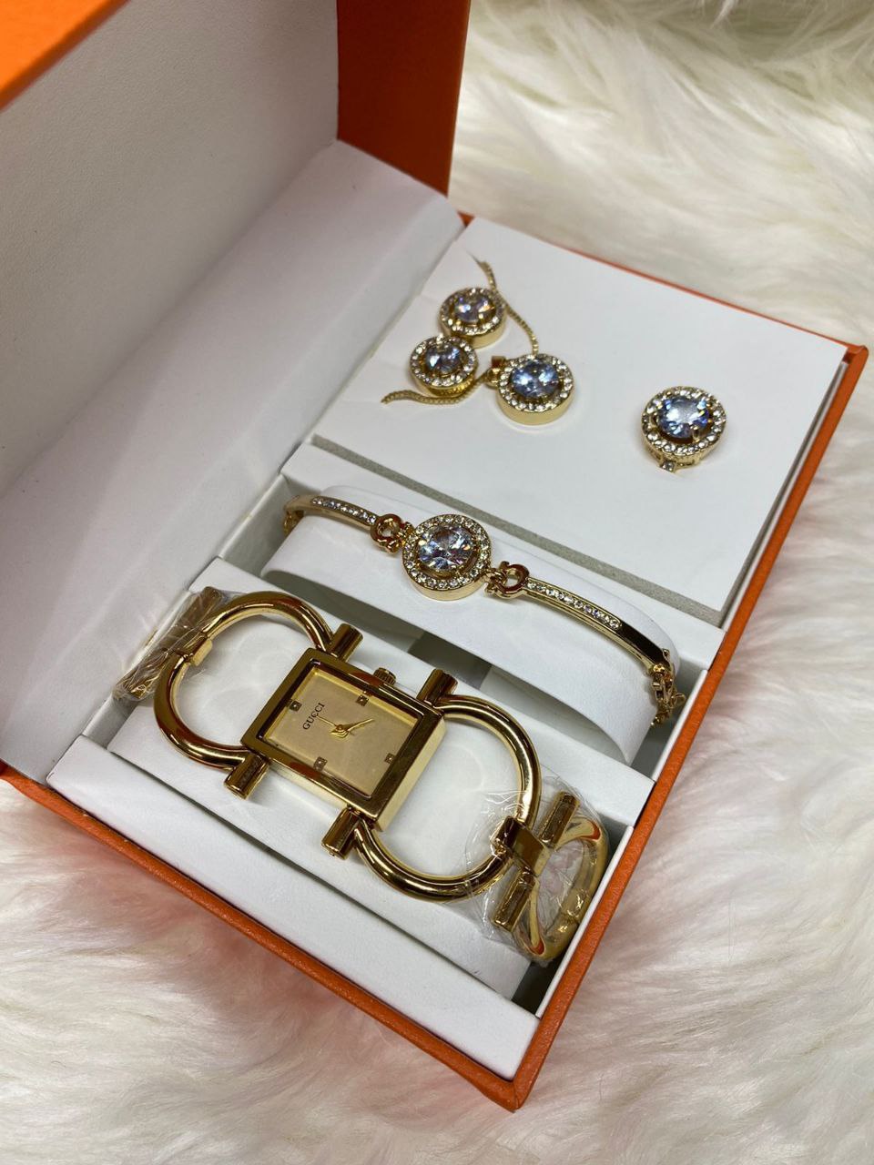 A SET OF WATCH BRACELET NECKLACE EARRINGS RING