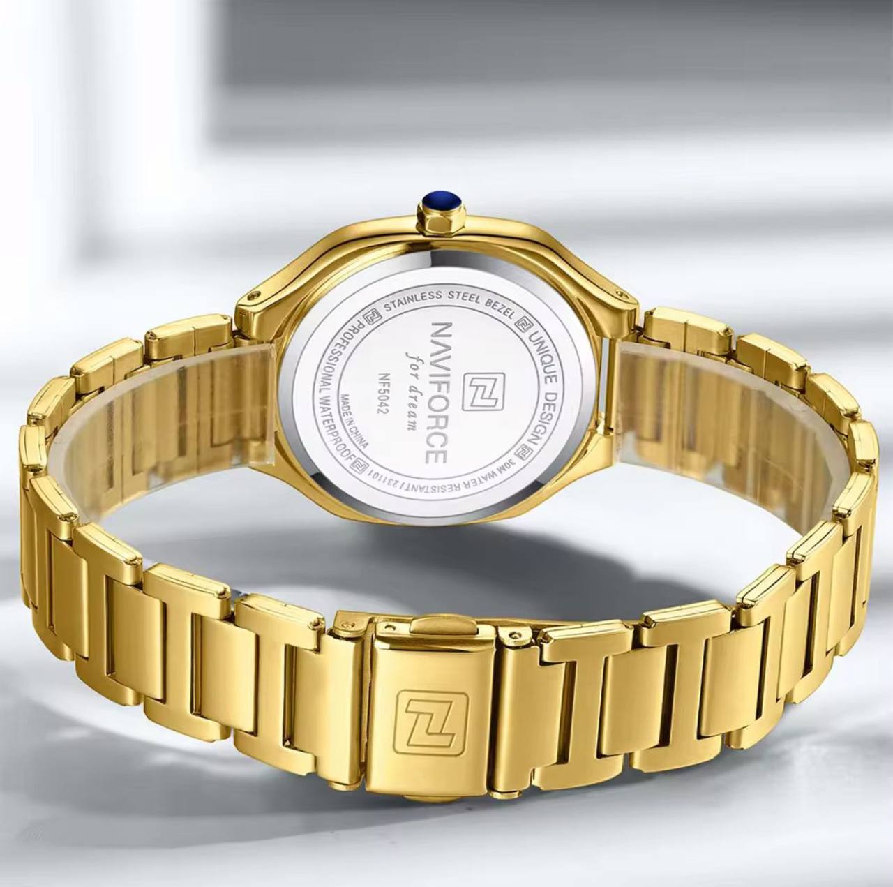 NAVIFORCE GENTS WATCH #NF 9117 DAY AND DATE DISPLAY STAINLESS STEEL FINISH WATER RESISTANT BATTERY POWERED GOLD BLACK ENGRAVING SERVICES ENQUIRIES