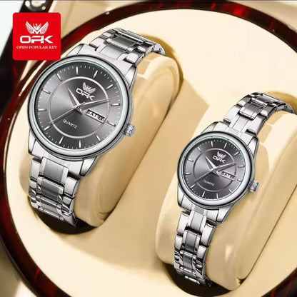 OPK COUPLE WATCH #6022 /= /= A PAIR DATE & DAY DISPLAY STAINLESS STEEL BATTERY POWERED WATER RESISTANT ENGRAVING SERVICES ENQUIRIES