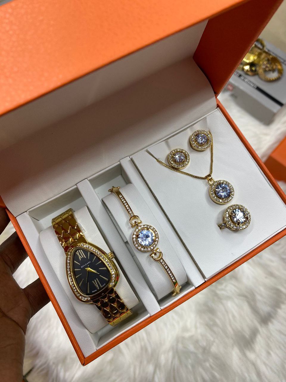 A SET OF WATCH BRACELET RING NECKLACE EARRINGS