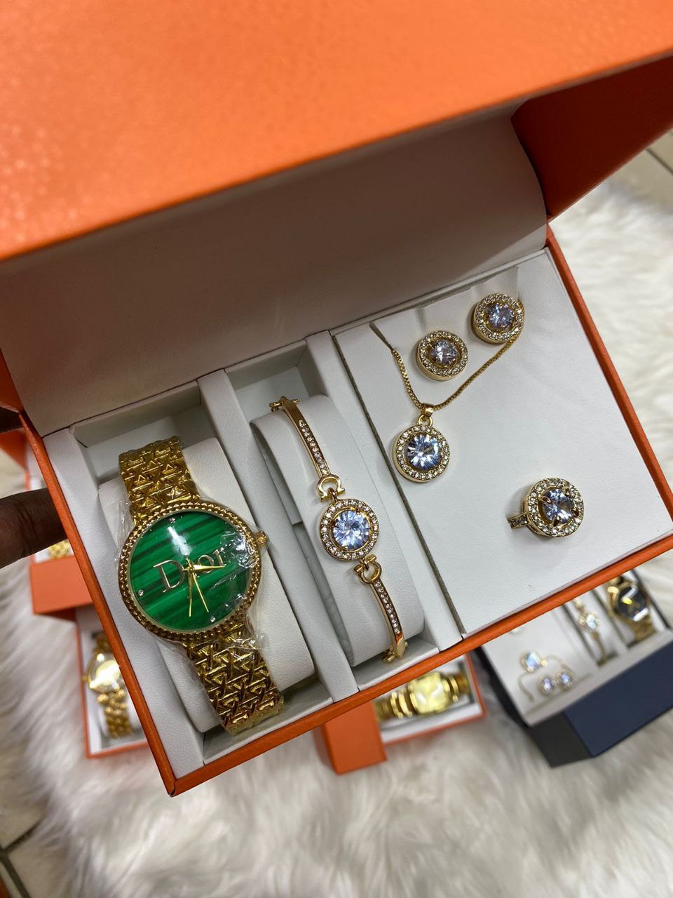 A SET OF WATCH BRACELET RING NECKLACE EARRINGS