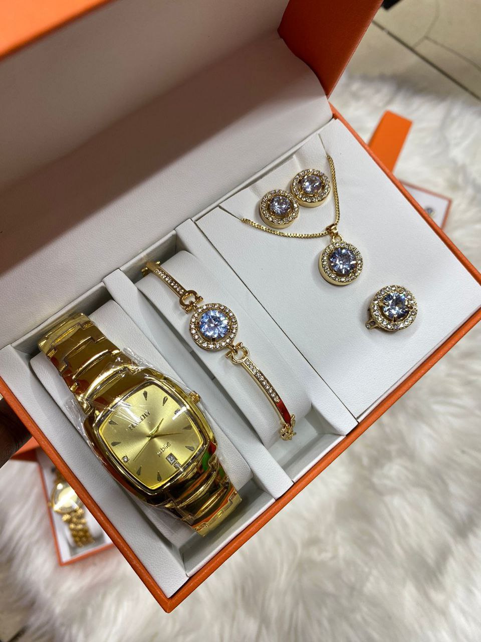 A SET OF WATCH BRACELET RING NECKLACE EARRINGS