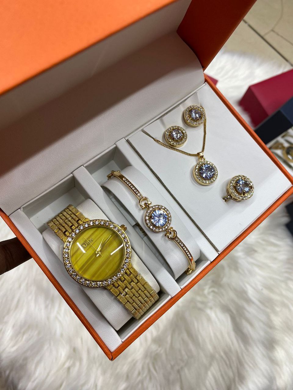 A SET OF WATCH BRACELET RING NECKLACE EARRINGS