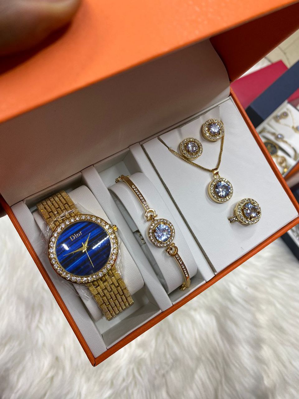 A SET OF WATCH BRACELET RING NECKLACE EARRINGS