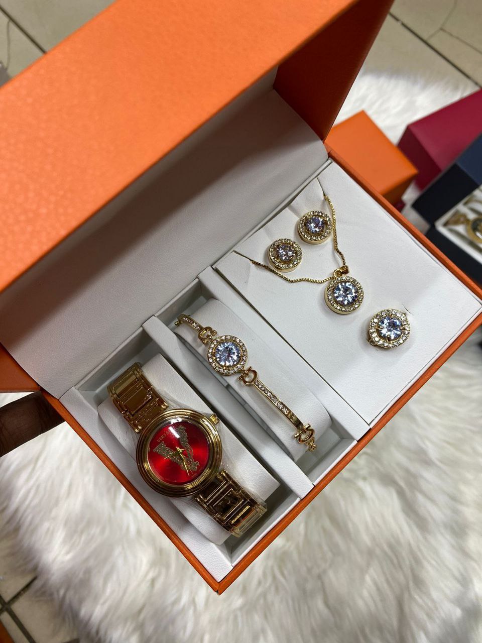 A SET OF WATCH BRACELET RING NECKLACE EARRINGS