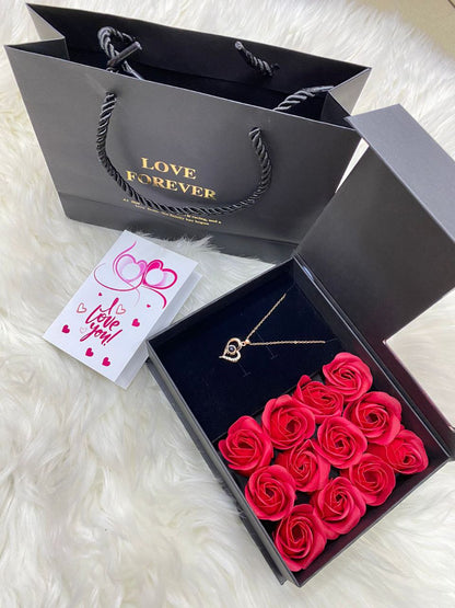 A SET OF I LOVE YOU 100 LANGUAGES NECKLACE LOVE FOREVER BOX AND BAG CARD