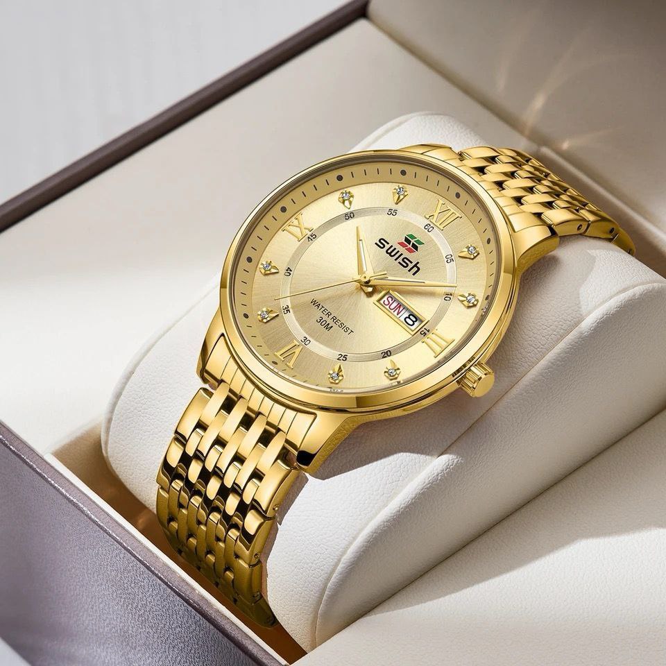 SWISH GENTS WATCH DAY&DATE DISPLAY BATTERY POWERED STAINLESS STEEL WATER RESISTANT TWO-TONE GOLDSILVER ENQUIRIES