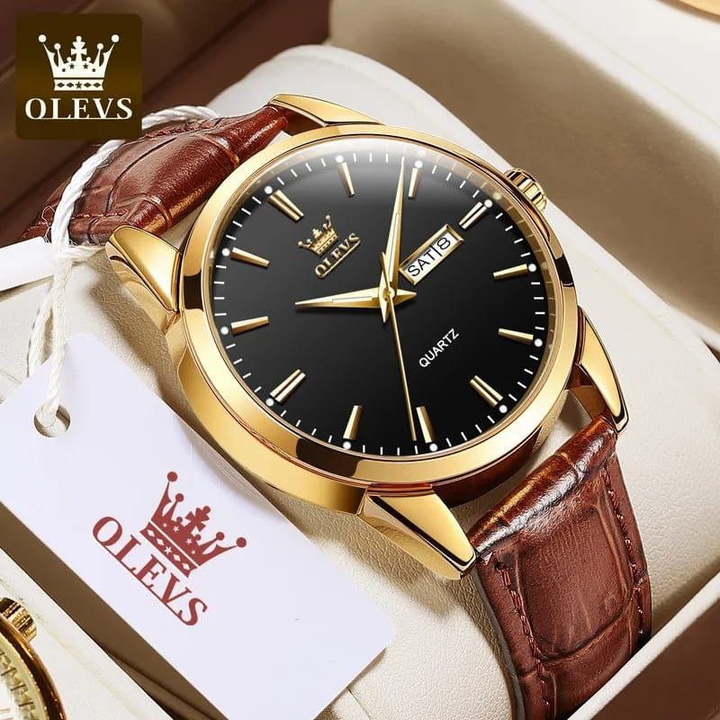 OLEVS MEN WATCH BATTERY POWERED DAY&DATE DISPLAY WATER RESISTANT HD LUMINOUS OLEVS BRANDED BOX GIFT BAG ENQUIRIES