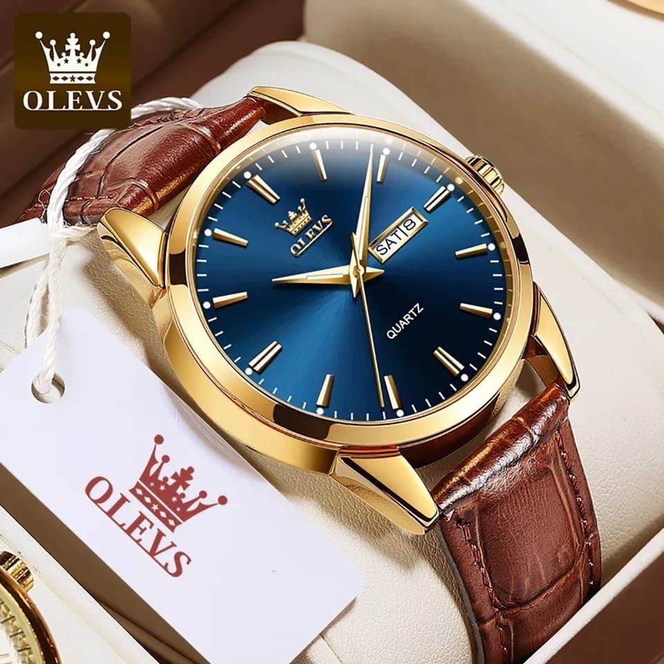 OLEVS MEN WATCH BATTERY POWERED DAY&DATE DISPLAY WATER RESISTANT HD LUMINOUS OLEVS BRANDED BOX GIFT BAG ENQUIRIES