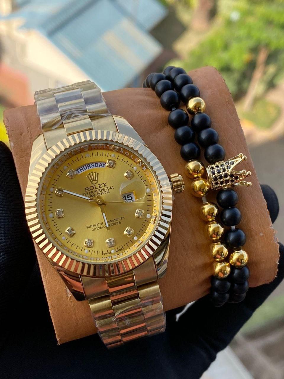 ROLEX X BANGLE FULL DAY AND DATE DISPLAY BATTERY POWERED WATER RESISTANT STAINLESS STEEL ROLEX BRANDED BOX