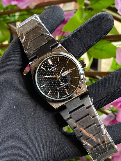 TISSOT DAY & DATE BATTERY POWERED WATER RESISTANT DAY & DATE DISPLAY STAINLESS STEEL FINISH ENQUIRIES