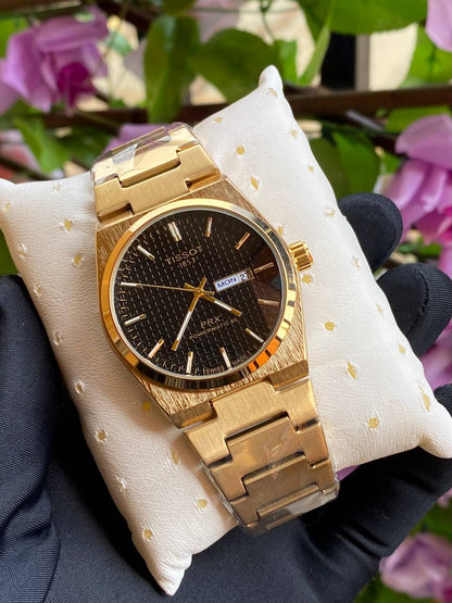 TISSOT DAY & DATE BATTERY POWERED WATER RESISTANT DAY & DATE DISPLAY STAINLESS STEEL FINISH ENQUIRIES