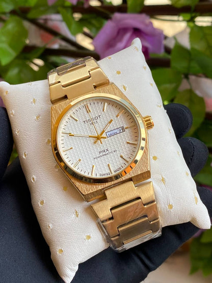 TISSOT DAY & DATE BATTERY POWERED WATER RESISTANT DAY & DATE DISPLAY STAINLESS STEEL FINISH ENQUIRIES