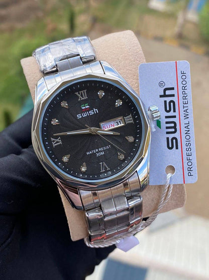 SWISH GENTS WATCH DAY&DATE DISPLAY BATTERY POWERED STAINLESS STEEL WATER RESISTANT TWO-TONE GOLDSILVER ENQUIRIES