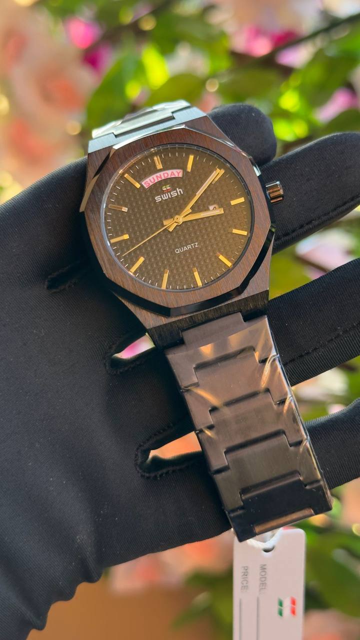 SWISH STYLISH GENTS WATCH DAY/DATE DISPLAY BATTERY POWERED STAINLESS STEEL WATER RESISTANT ENQUIRIES
