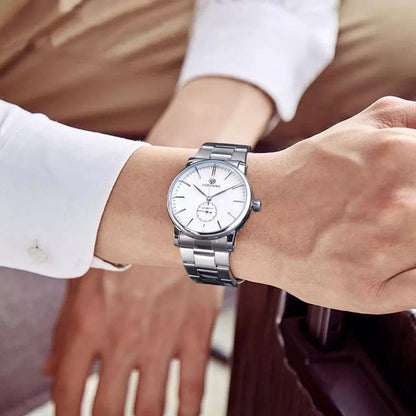 FORSINING AUTOMATIC GENTS WATCH AUTOMATIC MOVEMENT WATER RESISTANT STAINLESS STEEL COMES A BRANDED GIFT BOX ENQUIRIES