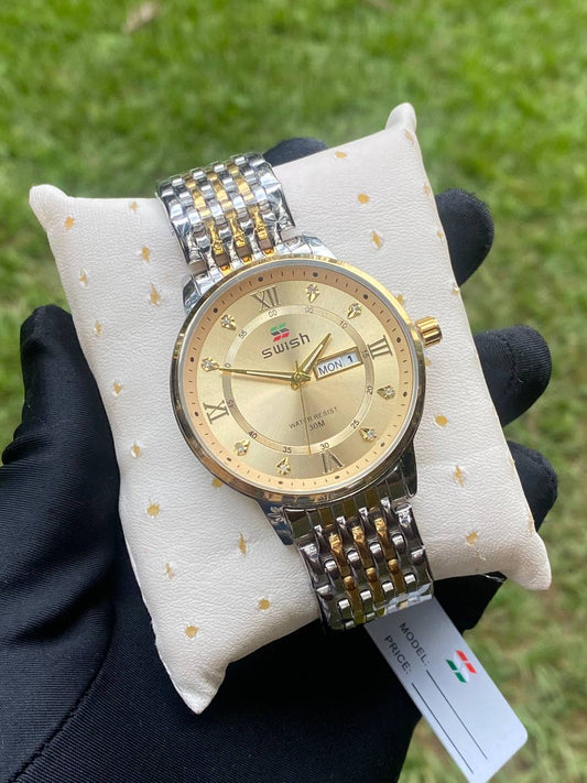 SWISH GENTS WATCH DAY&DATE DISPLAY WATER RESISTANT STAINLESS STEEL BATTERY POWERED ENQUIRIES