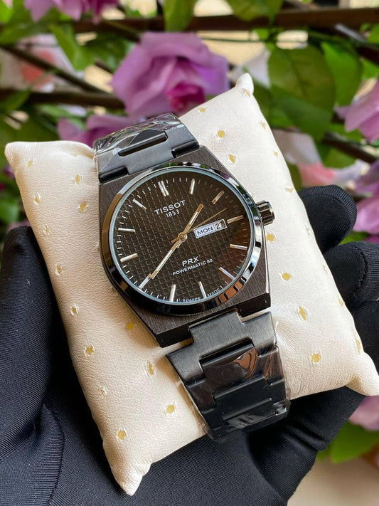 TISSOT DAY & DATE BATTERY POWERED WATER RESISTANT DAY & DATE DISPLAY STAINLESS STEEL FINISH ENQUIRIES