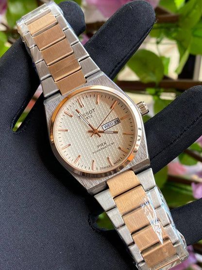 TISSOT DAY & DATE BATTERY POWERED WATER RESISTANT DAY & DATE DISPLAY STAINLESS STEEL FINISH ENQUIRIES