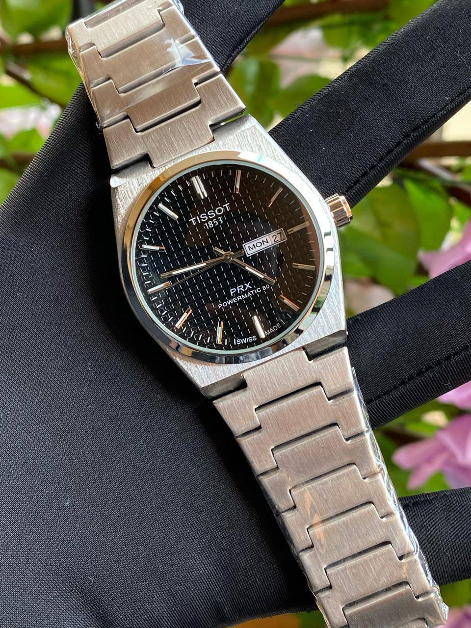 TISSOT DAY & DATE BATTERY POWERED WATER RESISTANT DAY & DATE DISPLAY STAINLESS STEEL FINISH ENQUIRIES