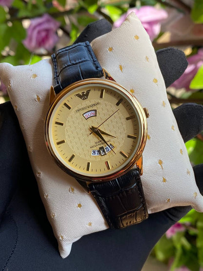 LEATHER DAY&DATE GENTS WATCH DAY&DATE DISPLAY WATER RESISTANT FINELY POLISHED LEATHER STRAP STAINLESS STEEL CASE ENQUIRIES