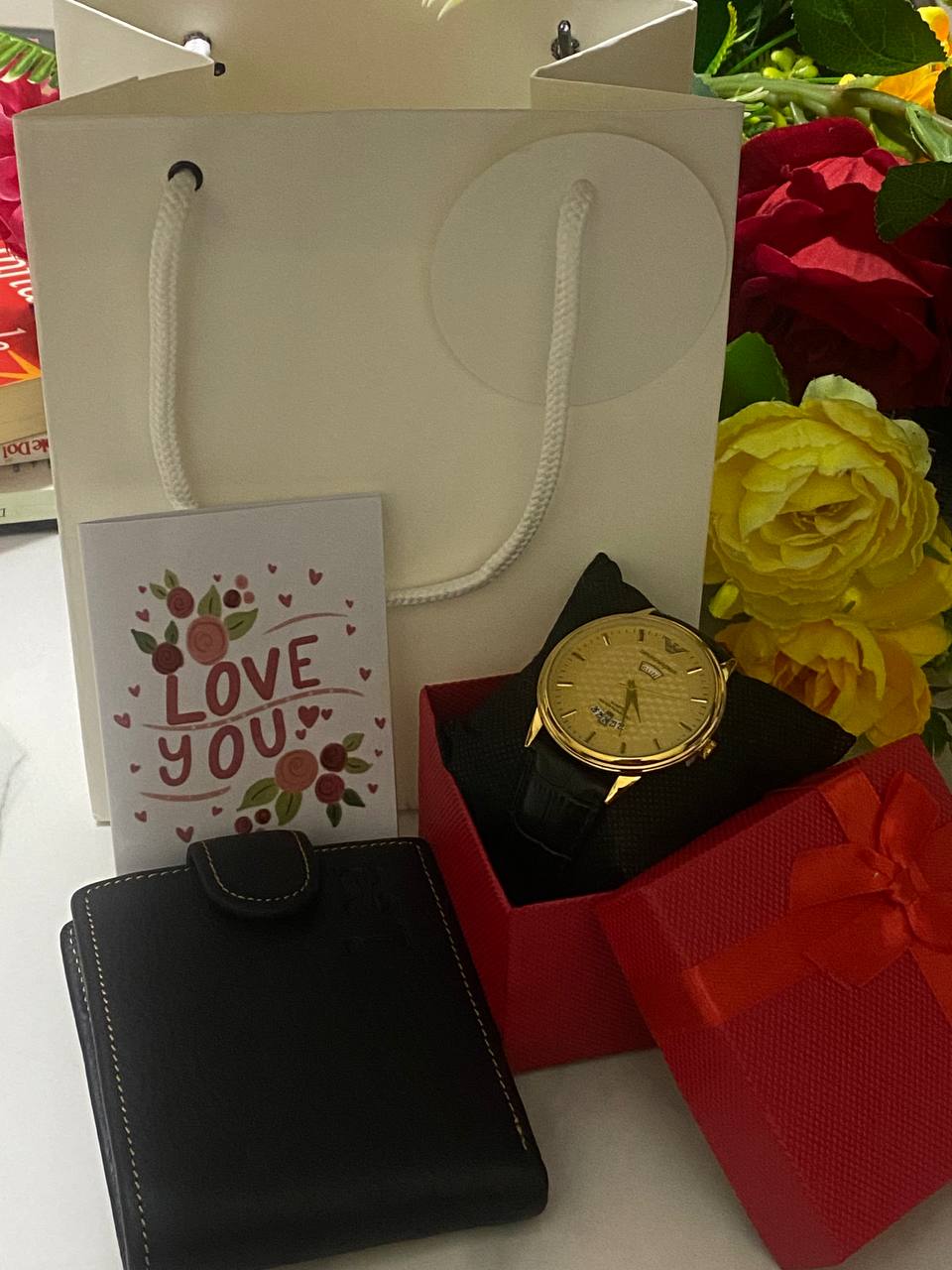 SWISH GENTS WATCH DAY&DATE DISPLAY BATTERY POWERED STAINLESS STEEL WATER RESISTANT TWO-TONE GOLDSILVER ENQUIRIES