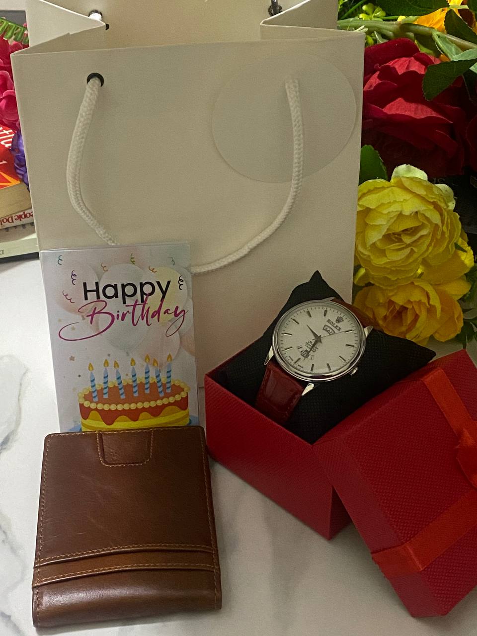 SWISH GENTS WATCH DAY&DATE DISPLAY BATTERY POWERED STAINLESS STEEL WATER RESISTANT TWO-TONE GOLDSILVER ENQUIRIES