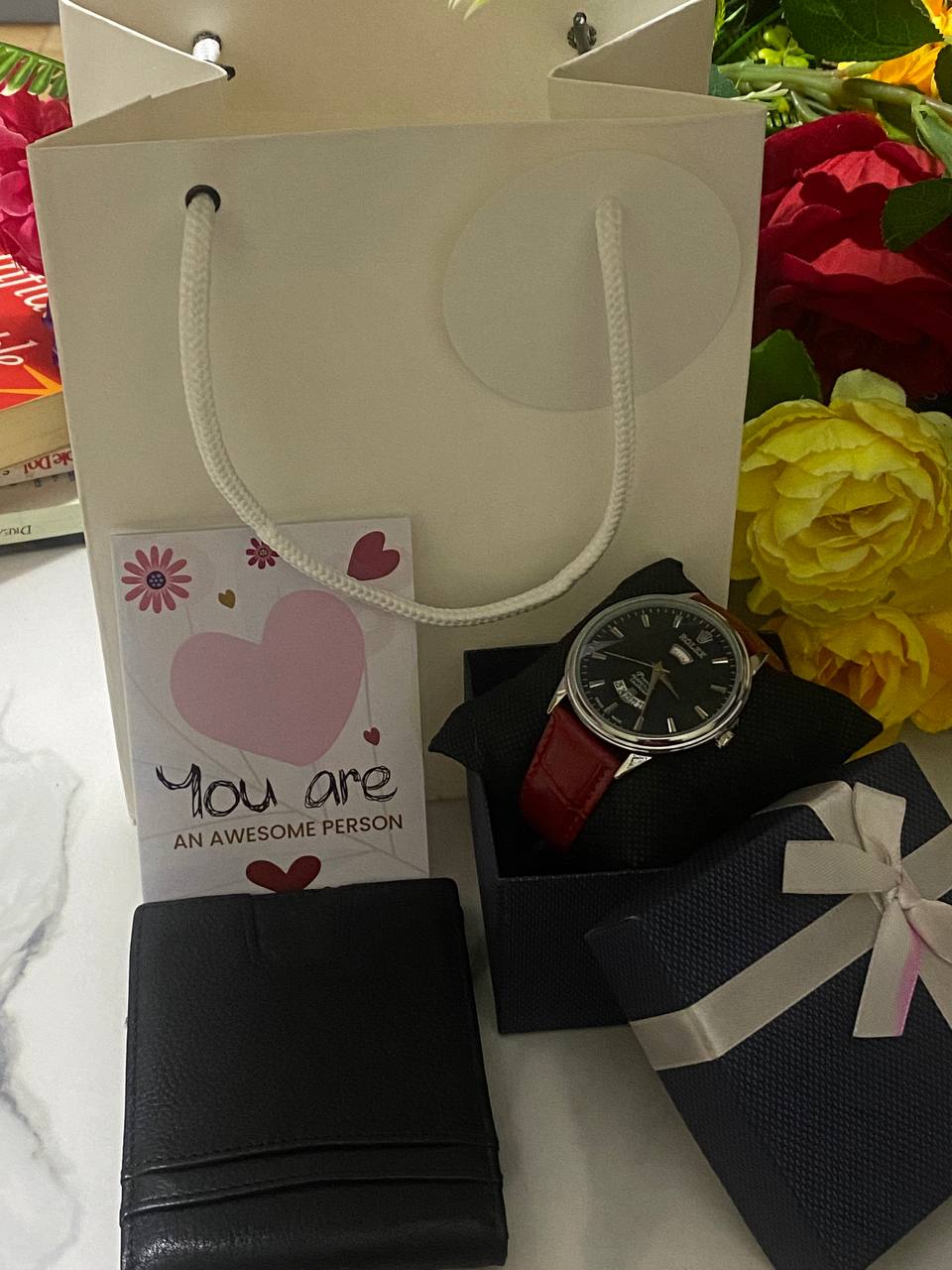 SWISH GENTS WATCH DAY&DATE DISPLAY BATTERY POWERED STAINLESS STEEL WATER RESISTANT TWO-TONE GOLDSILVER ENQUIRIES