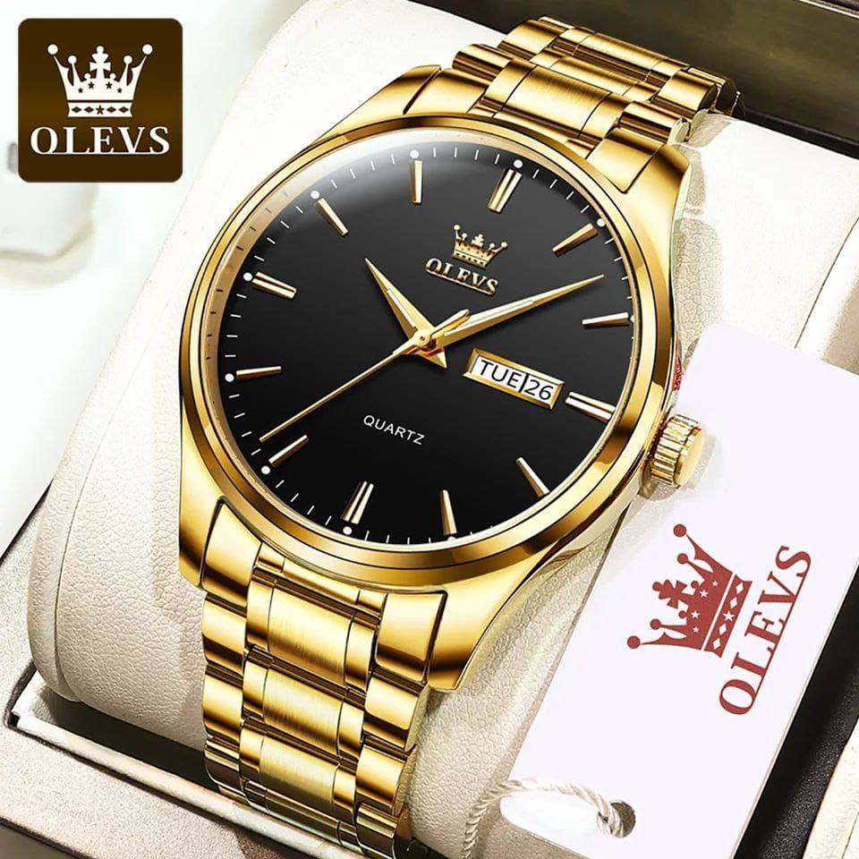 OLEVS MEN WATCH STAINLESS STEEL BATTERY POWERED DAY&DATE DISPLAY WATER RESISTANT HD LUMINOUS OLEVS BRANDED BOX ENQUIRIES
