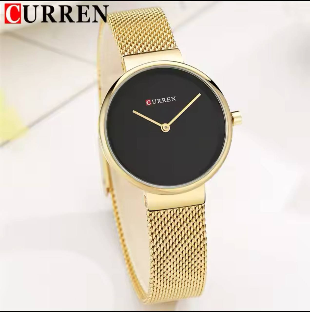 CURREN LADIES #9016 GOLD BLACKBLACK WATER RESISTANT BATTERY POWERED CURREN BRANDED BOX ENQUIRIES