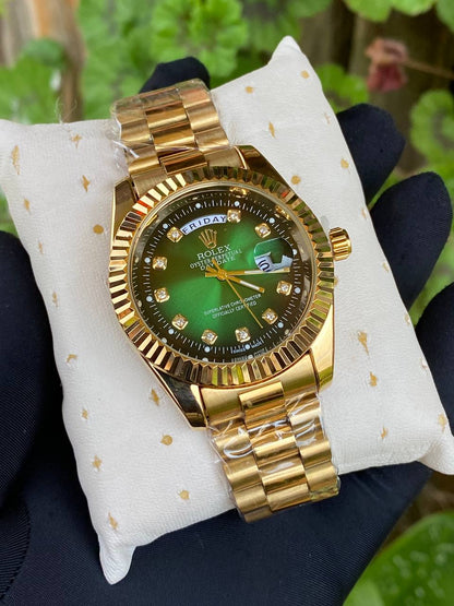 ROLEX COUPLE WATCHES SINGLE PIECE DAY AND DATE DISPLAY WATER RESISTANT BATTERY POWERED ENQUIRIES