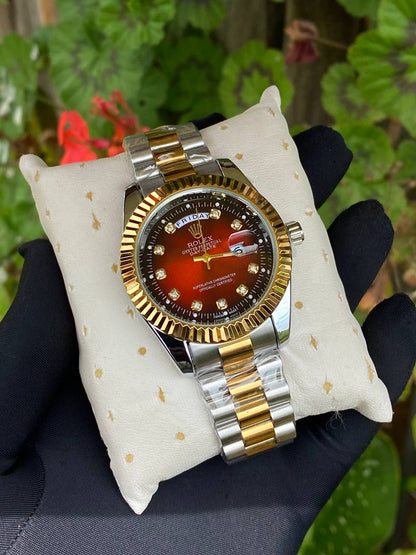 ROLEX COUPLE WATCHES SINGLE PIECE DAY AND DATE DISPLAY WATER RESISTANT BATTERY POWERED ENQUIRIES