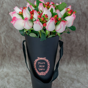 Pink Roses and Mixed Berry Flowers in a Black Vase.