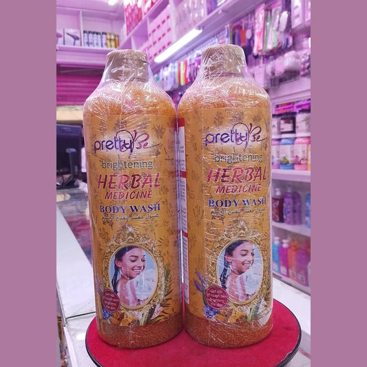 Two bottles of 'pretty me' herbal medicine body wash on a red platform with a store shelf in the background.