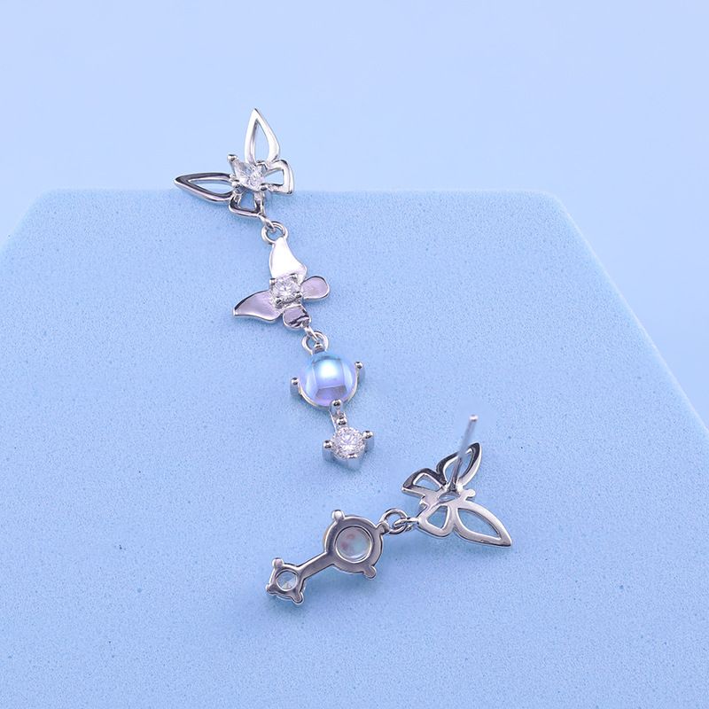 Super fairy Astral bow zircon earrings asymmetrical pendant earrings advanced touch temperament earrings female