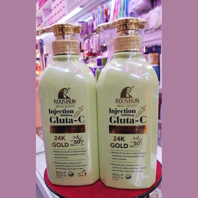 Two bottles of Roushun Injection Gluta-C with gold pumps on a red surface.
