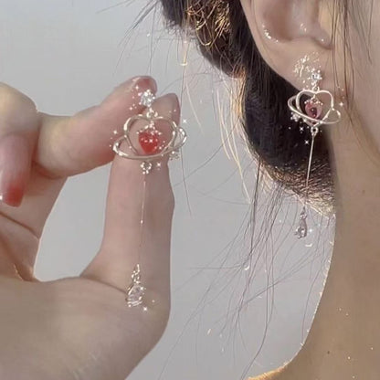 Long love-heart earrings and ear studs for women. They have a light luxury and elegant temperament.