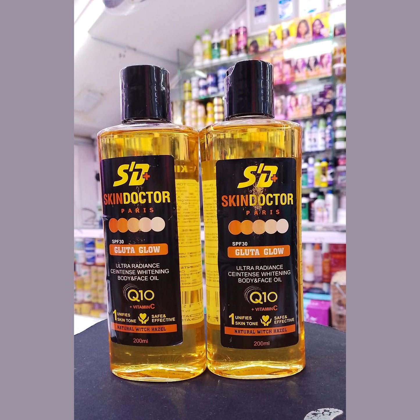 Glow-boosting oil with Q10, Vitamin C and Witch Hazel. Labeled SPF30—apply generously and reapply outdoors.