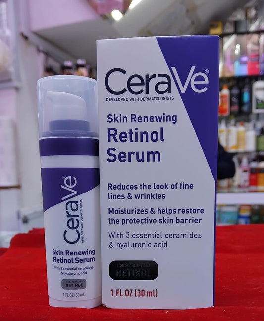 CeraVe Skin Renewing Retinol Serum bottle and packaging on a red surface with a blurred store background.