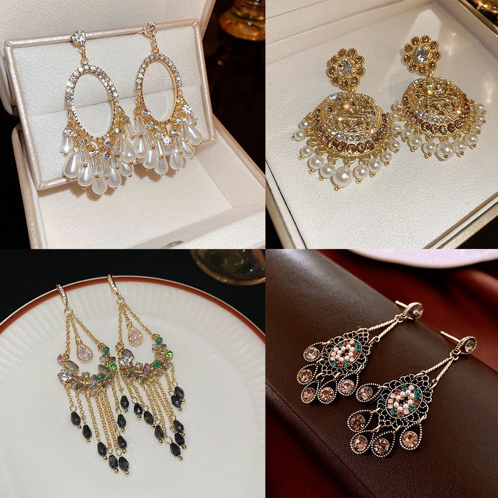 Vintage high-end silver needle ethnic style diamond inlaid flower earrings with exaggerated European and American temperament earrings pendant light luxury niche earrings